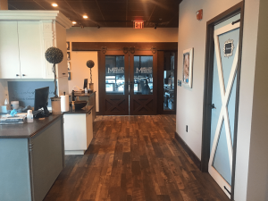Picture of entrance to Dr. Millers dental office- Hamburg Expressions, including barn doors.